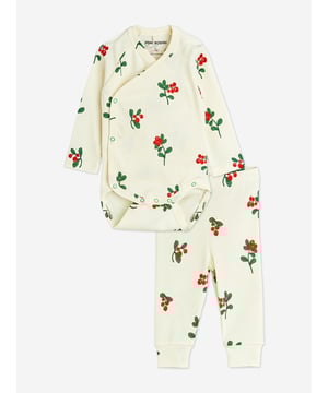 Introduce a touch of elegance to your little ones wardrobe with the mini rodini Baby Girls Lingonberries Bodysuit Set in Ivory. Perfect for SS2025, this set epitomises both comfort and style for the discerning infant.Key features include Exquisite Ivory Hue A chic, versatile colour to elegantly complement any occasion. Delightful Lingonberries Motif Adds a burst of charm and uniqueness. Premium Comfort Crafted with soft, luxurious fabrics for delicate skin. Durable Easy Care Designed to withstand the joys of play while easy to clean.A quintessential piece for a young lady of style.