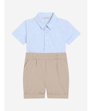 Introducing the prestigious Baby Boys Romper in Blue by Dolce Gabbana, a sterling addition for SS2025. Crafted in the heart of Italy, this exquisite piece blends luxury with playfulness, perfect for your young gentleman. Key features include Italian Craftsmanship Meticulously designed to ensure premium quality and longevity. Elegant Blue Hue A classic, vibrant shade that exudes sophistication. Comfort Fit Luxuriously soft fabrics guarantee comfort for all-day wear.Elevate your little one's wardrobe with this distinguished romperwhere style meets comfort.
