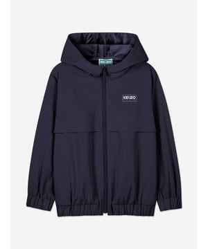Introducing the Kenzo Kids Hooded Windbreaker in Navy, an impeccable choice for both boys and girls this SS2025. Meticulously crafted, this piece not only promises to elevate your child's wardrobe but also offers exceptional comfort and durability. Key features include Sophisticated Navy Hue A deep, versatile blue that complements any outfit. Durable Water-Resistant Fabric Perfect for unpredictable weather. Signature Kenzo Print Adds a dash of designer flair. Lightweight Breathable Ideal for active, playful days. Unisex Design Suits both boys and girls exquisitely.Seize this stylish, functional garment for your young one's adventures!