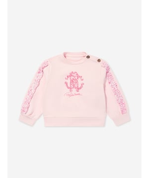 Introducing the exquisite Baby Girls Logo Sweatshirt in Pink by Roberto Cavalli, a splendid addition to any young wardrobe for SS2025. Essential features include Italian Craftsmanship Elegantly assembled in Italy, guaranteeing premium quality and longevity. Signature Print Features a delightful, stylish print that ensures your little one is always in vogue. Luxurious Comfort Constructed with superior fabrics for the utmost comfort during playful days. Ideal for the upcoming SS2025 season.Embrace timeless elegance for your baby with Roberto Cavalli's pink logo sweatshirt. Order now for fashion-forward elegance.