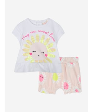 Introducing the exquisite Baby Girls Daisy Short Set in Pink by billieblush, a quintessential addition to any fashionable young wardrobe for SS2025! Key features include Delightful Daisy Motif Sprinkled with charming daisy prints for a chic, playful look. Luxurious Comfort Crafted with premium fabrics that are gentle on delicate skin. Perfect for SS2025 Ideal for summer days with a breathable design to keep your little one cool and stylish.Elevate her style this season a splendid blend of elegance and comfort!