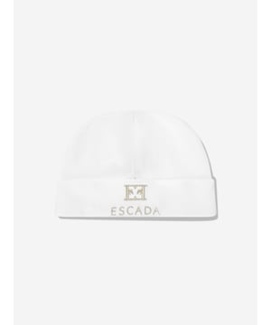 Elevate your little darling's style with the exquisite Baby Girls Embroidered Logo Beanie in White by Escada, a splendid addition for SS2025. Each beanie combines understated elegance and comfort. Key highlights include Luxurious Embroidery Features the iconic Escada logo intricately embroidered, adding a touch of luxury. Premium Material Crafted from the finest fabrics to ensure warmth and comfort against your baby girl's delicate skin. Versatile White A chic, crisp white that complements any outfit, making it perfect for any occasion. Add a flare of sophistication to your baby girls ensemble with this must-have designer beanie.