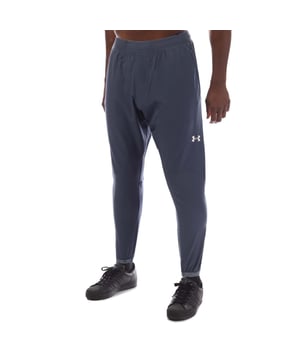 Heren Under Armour Vanish Track Pants in grijs.- Elastische tailleband met jacquard.- Zijzakken met rits.- Zakje met rits aan achterkant.- Gebrandmerkte manchetten.- Overal Under Armour logo.- Relaxed fit.- 59% Elastomultiester 41% Polyester.- Ref: 1388545044