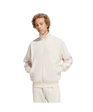 Mens adidas Originals Adicolor Classics Firebird Track Top in wonder white.A classic look gets the Adicolor treatment. This wardrobe essential sports the iconic Firebird style you know and love — but with a modern cut and fresh palette. The embroidered Trefoil logo on the chest and 3-Stripes down the arms are pure adidas DNA  while a stand-up collar gives you the attitude and edge you need to own your day. Keep essentials tucked away in the zip pockets  and stay cosy with ribbed cuffs. What's your favourite colour?- A track top made with a blend of recycled and renewable materials.- Loose fit- Full zip with stand-up collar- 100% polyester (recycled)- Zip pockets- Ribbed hem and cuffs- Machine wash cold delicate cycle- Ref: IR9892