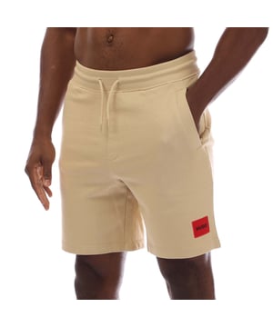 Heren HUGO Diz222 Cotton-terry short met rood logolabel in open beige.Easy-wear shorts ontworpen in zacht French-terry katoen van HUGO Menswear. Deze regular-fit short heeft een drawstring in de taille en een rood logolabel.- Regular fit- Elastische taille- Zakken onder achter: Zakken met vilt- 100% katoen.  Machinewasbaar- Ref: 50466196-285