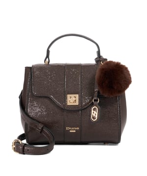 Dassios is the chic day bag that balances polish with practicality. Crafted with a contrasting textured side panel for a subtle style twist, it features a sleek turn-lock closure and a structured top handle for timeless appeal. Inside, the monogrammed lining reveals two spacious compartments ' one zipped for added security ' keeping your essentials neatly organised. Carry it by hand for a sophisticated look, or attach the optional long strap for a hands-free cross-body style. Finished with a removable logo and plush faux-fur pom-pom charm, Dassios is your go-to for effortless everyday elegance