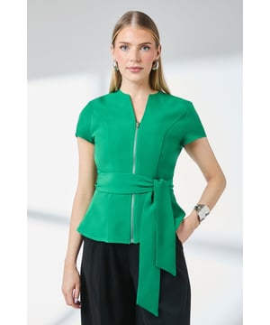 Stylish zip front design with contemporary crew neckline
        Flattering peplum silhouette that creates a feminine shape
        Adjustable tie waist belt for a customised fit
        Short sleeves perfect for transitional weather
        Stretchy woven fabric offering comfort and ease of movement
    
    This Principles zip front top combines practicality with polished style. The peplum design creates a flattering silhouette while the adjustable tie waist allows you to cinch in for a more defined look or wear loosely for casual comfort. Style with wide-leg trousers as shown for a contemporary daytime ensemble that works brilliantly for lunch dates or family gatherings. Add statement earrings and a sleek clutch for an effortless transition to early evening occasions. The versatile design makes it ideal for the office paired with tailored trousers or a pencil skirt. For more casual outings, team with your favourite jeans and trainers for an elevated weekend look that maintains sophistication without compromising on comfort.