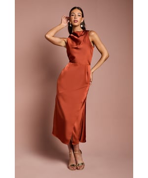 Elegant cowl neckline that drapes beautifully across the dcolletage
        Sleeveless design with sophisticated cut-away back detail
        Luxurious satin fabric that catches the light with every movement
        Figure-flattering midi length with subtle side slit for ease of movement
        Striking silhouette with defined waistline for a feminine shape
    
    Make a statement at your next special occasion with this stunning cowl neck midi dress from Coast. The fluid satin fabric creates an effortlessly elegant drape, whilst the sleeveless design showcases your shoulders beautifully. The sophisticated cut-away back adds an unexpected touch of allure, perfect for making an impression as you leave a room. Style with metallic strappy heels and statement earrings as shown for a refined ensemble that's ideal for weddings, the races or formal garden parties. For cooler evenings, layer with a tailored blazer or delicate pashmina. The versatile midi length works wonderfully for both daytime and evening events, making this dress a true wardrobe hero for your occasion wear collection.