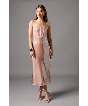 Striking bandeau corset design with structured bodice for elegant shaping
        All-over sequin embellishment that catches the light beautifully
        Sophisticated midi length with a graceful silhouette
        Fitted waistline that accentuates your natural curves
        Subtle stretch in the fabric allows for comfortable movement throughout your event
    
    Make a statement at your next special occasion with this show-stopping sequin midi dress from Coast. The structured corset bodice creates a flattering silhouette whilst the bandeau neckline offers a contemporary touch to this elegant piece. The midi length is perfect for formal events, striking the ideal balance between sophistication and modern style. Style with strappy heeled sandals as seen on our model, and add statement jewellery to complement the dress's sparkling finish. A sleek clutch bag and a tailored blazer draped over your shoulders would complete this refined ensemble beautifully. Ideal for weddings, the races or evening galas where you wish to command attention whilst maintaining an air of effortless grace.