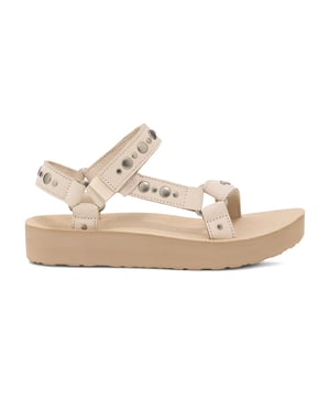 Amp up your summer with this metallic studded stunner. Cut from premium leather, our ultra-soft straps have been embellished with studs and paired with a cushy EVA footbed and roam-ready rubber sole to tackle wherever the day takes you