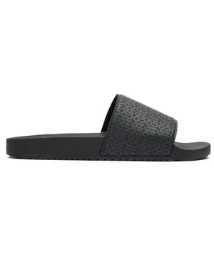 Sleek and sophisticated, the Hugo Timein slides in classic black offer comfort without compromising on style. These rubber sandals boast a contoured footbed that cradles your feet for all-day wearability. The textured outsole provides reliable grip, making them perfect for poolside lounging or casual summer outings. Effortlessly cool with HUGO's signature aesthetic, these slides combine practicality and contemporary design for the modern man.