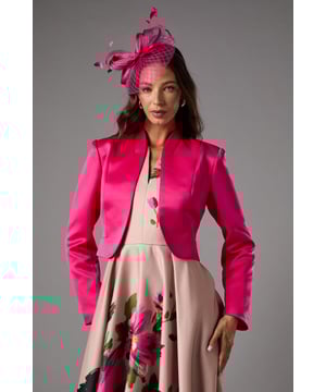 Luxurious satin crop jacket with a collarless design for a sleek, contemporary silhouette
        Structured shoulders and clean lines create an elegant, refined shape
        Delicate bow detail at the back adds a feminine finishing touch
        Regular fit allows comfortable layering over occasion dresses and tops
        Fully lined for a smooth, comfortable feel against the skin
    
    Make a striking statement at your next special occasion with this sophisticated satin crop jacket from Coast. The collarless design and clean lines present a modern take on formal dressing, whilst the cropped length perfectly complements high-waisted dresses and skirts. As shown, pair with a floral printed dress for a coordinated ensemble that's ideal for weddings, the races or summer garden parties. The structured silhouette and bow detail at the back offer a beautiful balance of strength and femininity. Layer over a sleeveless dress to transition your outfit from day to evening, or style with tailored trousers and a camisole for an alternative occasion look. This versatile jacket will become a cornerstone of your special event wardrobe, adding polish and refinement to countless ensembles.