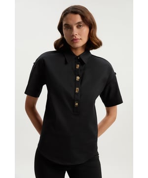 Feel formal in our shirt, with high quality cotton fabric, as well as a straight fit and short sleeves, and metallic clasp detailing down the front. Style it with anything from tailored trousers to denim jeans for looks perfect for anything from office days to dinner dates. Techno Cotton Woven Short Sleeve Hardwear Detail Shirt High Quality, Soft Cotton Fabric Flattering Straight Fit Formal Collar Accent Casual Short Sleeves Gold Clasp DetailingBrowse this seasons women's work tops or discover the full range of workwear now.Matching piece sold separately.