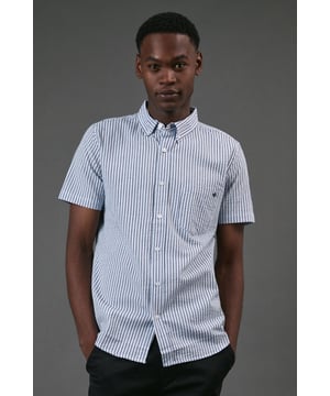 Classic button-down collar for a smart-casual finish
        Distinctive seersucker fabric with textured multi-stripe pattern
        Practical chest pocket with Maine brand detailing
        Short sleeves with neat hems for warm-weather comfort
        Box pleat at back for enhanced movement and fit
    
    This Maine seersucker shirt combines timeless style with practical warm-weather design. The textured multi-stripe pattern creates visual interest while the lightweight woven fabric offers breathability perfect for summer days. Style with dark chinos and white trainers for a relaxed weekend look, as shown, or pair with tailored shorts and loafers for garden parties and casual gatherings. The versatile button-down design transitions effortlessly from daytime outings to evening barbecues. For a layered approach, wear unbuttoned over a plain t-shirt with rolled sleeves. The classic fit provides comfortable movement without sacrificing style, making this shirt an essential addition to your casual wardrobe that will serve you well through numerous summer seasons.