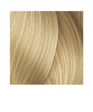MAJIREL HIGH-LIFT #ash von L&#39,Oréal Professionnel . Permanente Haarfarbe, inspiriert von den neuesten Trends im kühlen Blond. Holen Sie sich eisiges Blond mit MAJIREL HIGH-LIFT! Diese permanente Haarfarbe verwandelt Ihr Haar (unabhängig vom Grundton) in nur einem Schritt in Blond. Erhältlich in einer großen Auswahl an eisigen Blondtönen, von neutral bis platinblond. Die Deckkraft deckt graue Haare nicht ab, sie kann jedoch auf Haaren mit einem geringen Anteil grauer Haare angewendet werden. Die Aufhellungskraft beträgt bis zu 4,5 Nuancen. Angereichert mit dem Iogène G- und Incell-Komplex pflegt es die Haarfaser von der Wurzel bis zur Spitze, sorgt für Geschmeidigkeit und gibt eine helle und leuchtende Farbe wieder.