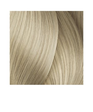 MAJIREL HIGH-LIFT #ash von L&#39,Oréal Professionnel . Permanente Haarfarbe, inspiriert von den neuesten Trends im kühlen Blond. Holen Sie sich eisiges Blond mit MAJIREL HIGH-LIFT! Diese permanente Haarfarbe verwandelt Ihr Haar (unabhängig vom Grundton) in nur einem Schritt in Blond. Erhältlich in einer großen Auswahl an eisigen Blondtönen, von neutral bis platinblond. Die Deckkraft deckt graue Haare nicht ab, sie kann jedoch auf Haaren mit einem geringen Anteil grauer Haare angewendet werden. Die Aufhellungskraft beträgt bis zu 4,5 Nuancen. Angereichert mit dem Iogène G- und Incell-Komplex pflegt es die Haarfaser von der Wurzel bis zur Spitze, sorgt für Geschmeidigkeit und gibt eine helle und leuchtende Farbe wieder.