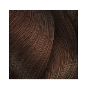 Die MAJIREL Ionène G Creme Coloration #5,32 von LOréal Expert Professionnel bietet eine professionelle, langanhaltende Färbung mit ausgezeichneter Deckkraft. Diese permanente Haarfarbe umfasst eine breite Palette an Nuancen, die es leicht machen, den gewünschten Farbton zu finden, ganz gleich, ob man aufhellen oder abdunkeln möchte. Sie gewährleistet eine vollständige Abdeckung von grauen Haaren und ermöglicht es, bis zu drei Nuancen heller oder dunkler zu färben. Bereits nach 35 Minuten Anwendung erhält das Haar eine strahlende Farbe, während es durch die schonende Formel weiterhin glänzend und geschmeidig bleibt.