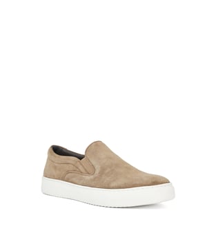 Crafted from premium, soft suede this contemporary slip-on trainer rests on a super lightweight cup sole. Leather lined with a comfort sock, Tillos is refined enough to pair with both shorts and relaxed tailoring.