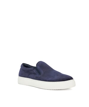 Crafted from premium, soft suede this contemporary slip-on trainer rests on a super lightweight cup sole. Leather lined with a comfort sock, Tillos is refined enough to pair with both shorts and relaxed tailoring.