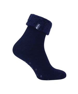 THMO Men’s Thermal Turnover Bed Socks: Embrace the cosy comfort of our THMO Bed Socks, your perfect pair for those chilly winter days and nights. As the temperature drops, it's essential to keep yourself warm while also saving on heating bills. Treat yourself to the ultimate warmth without compromising your budget. Crafted using a specially selected heavy bulk acrylic yarn, these socks possess exceptional thermal qualities that will keep your feet cosy even in the coldest of winters. . An innovative anti-slip grip has been designed onto the foot of the sock in order to prevent you from slipping on surfaces such as hard wooden floors or kitchen tiles. It is a simple but effective dotted design on the foot of the sock. By effectively trapping warm air and enveloping your feet in comfort, these bed socks are the perfect choice for those moments of indoor relaxation and tranquillity. The THMO badge is also heat transferred onto the side of the sock. These THMO thermal bed socks are available in 3 colours: Black, Navy & Charcoal, with dotted grippers. They are available in one size Men’s 6-11 UK. They are made from 93% Acrylic, 6% Polyamide & 1% Elastane. They are also safely machine washable. Extra Product Details: THMO Slipper Bed Socks Double Brushed Inner Thick & Warm Hand Linked Toe Turnover Top Non-Slip Grippers 3 Colour Options Men’s One Size 6-11 UK Machine Washable