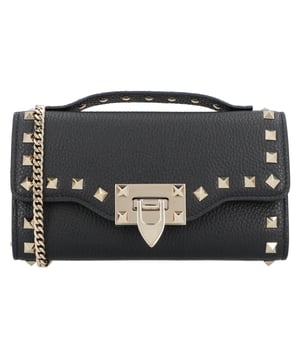 - Calfskin rockstud handbag by valentino garavani, grained leather design, beading made with the brand's iconic studs applied on front and back, front closure by swivel, iconic brand monogram printed in pressure and contrasting on back, removable chain shoulder strap, contrasting studded leather top handle.
- Made in Italy
- Dimensions: W 19 x H 10 x D 4 cm Measurments:  width: 40 mm length: 190 mm height: 100 mm