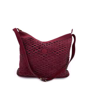VINTAGE, RRP AS NEW
FENDI Vintage Perforated Suede Bucket Bag - Effortless Style in Rare Merlot  A standout piece for vintage lovers and collectors alike, this FENDI vintage bucket/crossbody bag is a rare and unique gem that blends relaxed elegance with everyday practicality. Crafted in rich burgundy perforated suede, it features a soft, unstructured silhouette that adds an effortless, lived-in charm to any outfit. It features upper zipper closure and gold metal hardware.  Designed for function as much as fashion, the bag includes an attached matching coin purse-a thoughtful vintage detail that keeps your small essentials close at hand. The adjustable crossbody strap makes it ideal for on-the-go wear, while the roomy interior ensures space for all your daily must-haves.  Perfect for those who appreciate understated luxury with a hint of retro cool, this FENDI bag is not just an accessory-it's a conversation piece, a functional beauty from the golden days of Italian fashion. 'Fendi s.a.s Roma - Made in Italy' tag inside Condition Rating: B - VERY GOOD CONDITIONCondition Details: Some wear of use on suede due to normal use. Some wear of use on the internal lining. Please check the photos carefully and ask if you need to know more details or if you have any doubts.Measurements (cm):Depth: 10.2Height: 33.0Length: 39.4Other Details: Dustbag? NoKeys? NoBox? No Measurments:  width: 102 mm length: 394 mm height: 330 mm