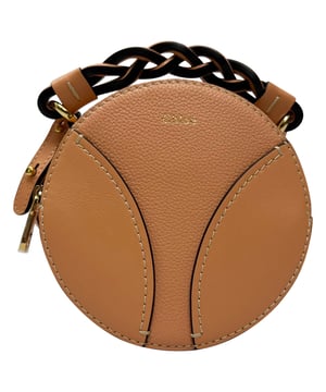 VINTAGE, RRP AS NEW
The Chloé Mini Daria Round Shoulder Bag in Brown Leather combines artisanal craftsmanship with a modern silhouette, featuring braided top handles and rich, supple leather. Compact yet refined, it’s perfect for carrying your essentials in everyday elegance. **Style tip:** Wear it crossbody with a flowy boho dress and ankle boots for a relaxed weekend look, or pair with tailored separates to add a touch of earthy sophistication.

 Chloé Mini Daria Round Shoulder Bag in Brown Leather

Condition: Excellent
Signs of wear: No visible signs of wear
Packaging: None
Color: Brown
Material: Leather | leather
Size: One Size | One Size
Measurements: Handle drop: 190 mm; Strap length: 1100 mm; Width 60 mm Height 150 mm Length 150 mm
SKU: TONPUGBBA524164M