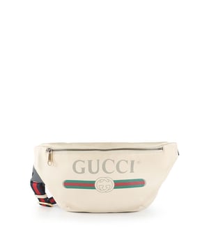 VINTAGE, RRP AS NEW
This Gucci bag is crafted from beige calfskin leather. The bag features one adjustable belt that can be worn on the hip or waist with Gucci logo at the front, a front zipper which opens to a beige canvas lined interior compartment, and silver tone hardware. The bag is in good condition, yet the leather has darkened and shows minor scratches, the bottom is scuffed, and there is one visible stain on the interior. The hardware is slightly tarnished and scratched. Product Code: 493369  525040.
 Gucci Beige Calfskin Leather Waist Bag
Color: beige
Material: Leather | Calfskin leather
Condition: good
Size: One Size 
Sign of wear: No
SKU: 234206 / GLB-6230 / GLB-6230 
Dimensions:  Length: 165 mm, Width: 65 mm, Height: 300 mm
 Gucci Beige Calfskin Leather Waist Bag
Color: brown | beige
Material: Leather | Calfskin leather
Condition: good
Size: One Size | One Size
Sign of wear: No
SKU: 444392 / GLB-6230 / GLB-6230 
Dimensions:  Length: 165 mm, Width: 65 mm, Height: 300 mm