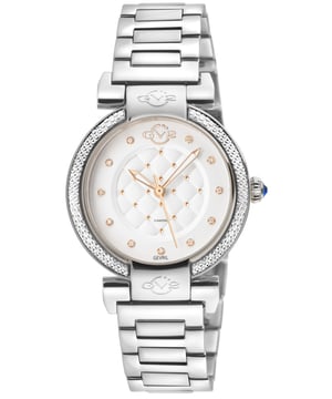 In the realm of refinement, a lady instinctively appreciates the eloquence that resides upon her wrist.  The right timepiece, adorning your wrist with grace, unveils a profound declaration of your essence. When you choose to embrace the ladies GV2 Berletta, you ensure that your message is one of unerring sophistication and discerning taste.  This masterpiece of horological artistry, impeccably detailed and graced with a timeless three-hand configuration, serves as the epitome of understated elegance. Each glance at the dial, meticulously quilted and bedecked with fifteen exquisite diamonds, draws you into a world where luxury speaks in hushed tones. Discreet raised studs, a testament to subtlety, assume their roles as indices, while a fluted crown, adorned with a resplendent blue cabochon, stands as the crowning jewel of this inspired design.  A diamond-cut bezel, a sparkling diadem, elegantly encircles the dial, its brilliance framed by lugs that bear the prestigious GV2 logo. The result is an exquisite tapestry of craftsmanship and sophistication that gracefully enhances any ensemble you choose to adorn.
