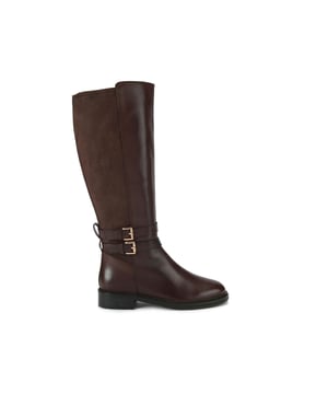 This KG Kurt Geiger pair of Trying brown leather knee high boots feature two buckled straps around the ankle.