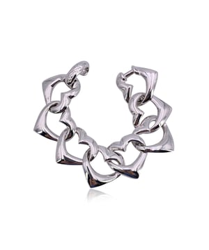 VINTAGE, RRP AS NEW
A true gem from the past, this vintage Yves Saint Laurent silver metal bracelet captures the bold romance of the house's iconic era. Designed in a charming heart chain link motif, each link echoes YSL's flair for mixing elegance with edge. The bracelet features a secure hook closure and measures a delicate 6.5 inches (16.5 cm) at full length - perfect for gracing the wrist with just the right touch of vintage Parisian allure. A timeless piece for lovers of fashion history and refined detail. Condition Rating: A - EXCELLENTCondition Details: Gently used. Please, look carefully at the photos and ask for any detail.  Box?: ?: No