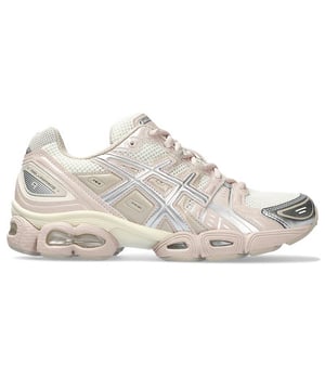 Elevate your everyday run with the ASICS Gel-Nimbus 9—a classic cushioned trainer reimagined with a sleek, neutral beige colorway. Originally released in the 2000s, this retro running shoe blends performance comfort with lifestyle appeal, making it perfect for both your workouts and your wardrobe.
Key Features:
GEL™ Technology Cushioning: 

Rearfoot and forefoot GEL™ inserts deliver advanced shock absorption for smoother strides and reduced joint impact.

Mesh Upper with Synthetic Overlays: 

Lightweight and breathable mesh ensures optimal airflow, while synthetic leather overlays add structure and support.

TRUSSTIC™ Support System: 

Midfoot stability technology enhances support without sacrificing flexibility.

Cushioned EVA Midsole: 

Offers long-lasting comfort and a responsive ride, ideal for extended wear.

Durable Rubber Outsole: 

Provides excellent traction on varied surfaces for reliable grip mile after mile.

Retro Aesthetic: 

Inspired by early 2000s running shoes, its Y2K design details pair effortlessly with casual or sporty looks.