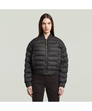 Raised collar. Zipper closure. Stretchable cuffs and waist. Welt pockets at the waist, snap button closure. Zip closure. Jacket Lightweight Quilted is designed in a loose fit and stitched through horizontally. The sleeves and waist are finished with a stretchable edge to block out the wind. 100% Recycled polyester. Compact woven plain 1x1 construction. Lining and padding: 100% Recycled polyester. Loose