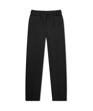 • Brand: GANNI
 • Material: 48% LENZING™ ECOVERO™ 47% Rec PES 5% EL
 • Design: Designed with a mid-rise waist, the pant features a zip and button closure, belt loops, and side pockets, ensuring both functionality and style. The subtle tonal stripe throughout adds a touch of sophistication, while the pleats running from the waist to the ankle, accentuated with contrast black stitching, introduce a modern edge
 • Colour: Phantom
 • Style: Whether paired with a tailored blazer for a polished look or a casual tee for a more relaxed ensemble, the GANNI Mid Waist Pant in Phantom offers versatility and style. Its timeless design ensures it remains a staple in any wardrobe, transitioning seamlessly from day to night