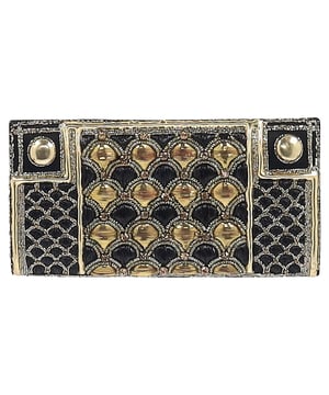 VINTAGE, RRP AS NEW
The Balmain Embellished Flap Clutch Bag in black and gold silk exudes opulence, adorned with intricate embellishments and the house’s signature bold detailing. Its sleek silhouette and luxurious finish make it the perfect statement accessory for evening occasions. **Style tip:** Pair it with a black tailored jumpsuit or a metallic gown to let the clutch shine as the centerpiece of your ensemble.

Balmain Embellished Flap Clutch Bag in Black and Gold Silk

Condition: Excellent
Signs of wear: No retail tag, No visible sign of wear., 
Packaging: None
Color: Black
Material: Silk
Size: One Size | One Size
Measurements: Width: 20; Height: 120; Length: 240
SKU: NAPPUGBSM524364W