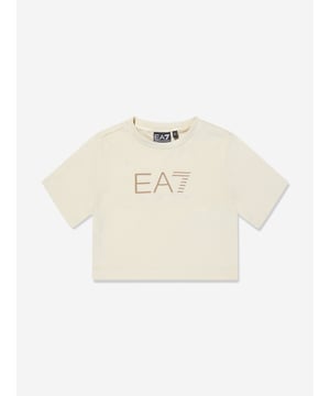 Introducing the EA7 Emporio Armani Girls Logo T-Shirt in Ivory, a timeless addition to your girl's SS2025 wardrobe essentials. Elegantly crafted, it blends high fashion with everyday functionality. Key features include Distinctive EA7 Logo Embodies luxury with the iconic Emporio Armani branding, ensuring standout style. Premium Fabric Crafted from superior quality materials for unmatched comfort long-lasting wear. Versatile Ivory Shade Easily pairs with any outfit, enhancing versatility and chicness. Designed for Girls Tailored specifically to fit young fashionistas with impeccable taste.Elevate her style with this exquisite piece from EA7 Emporio Armani. Shop now!