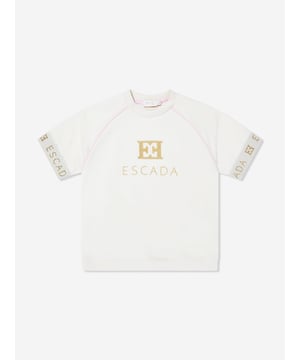 German heritage luxury label Escada embody modern innovation with timeless elegance. This girls snow white short sleeve t-shirt is woven in the finest high quality. It showcases Escada embroidery for a sleek and unforgettable look. Round Neck Short Sleeves Straight Hem 95 Cotton, 5 Elastane