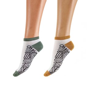 A new range of socks and liners, all knitted in bamboo - a beautifully soft and sustainable yarn. Creating organic shapes with our abstract leaf trainer socks. Made with bamboo cotton for a super soft handle, a must have for your sock drawer!