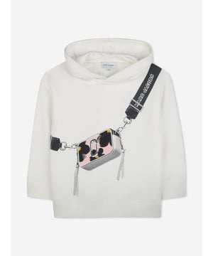 Marc Jacobs project enigmatic detailing and high quality construction into their forward-thinking aesthetics. This girls ivory hoodie is woven in a refined organic cotton blend via beautiful French terry. Features a trompe l'oeil "Snapshot" bag illustration with MARC JACOBS branding and Daisies allover print on the bag. Organic CottonPolyester Long Sleeves Ribbed Trims Green Around 87 Cotton, 13 Polyester