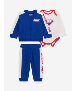 Introduce a splash of chic to your little chap's ensemble with the Guess Baby Boys 3 Piece Tracksuit Set in a radiant blue. Perfectly tailored for SS2025, this set ensures he looks dapper while promising unmatched comfort. Key features include Elegant Design Crafted with care, featuring stylish accents modern tailoring. Supreme Comfort Luxuriously soft fabrics that care for delicate skin. Versatile Wear Ideal for playdates or casual outings. Elevate his wardrobe with this exquisite set by Guess.