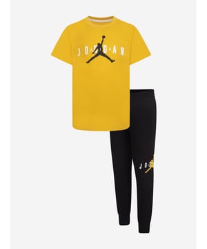 Introducing the Kids Jumpman Sustainable Trouser Set in Yellow, the latest venture from Jordan into sustainable fashion. This attire offers style and practicality, making it an ideal fit for SS2024. Its key features include Sustainable Design Crafted from eco-friendly materials, the trouser set ascertains that your child's style doesn't harm the planet. Statement Hue The vibrant yellow boosts the sets appeal, letting your kid make a trendy fashion statement. Versatility Tailored to fit both boy and girl wardrobes, this trouser set ensures outstanding comfort and unrivalled style. Elite Brand Coming from Jordan, a renowned name in fashion, this set leads the way in high-end children's wear.This Kids Jumpman Sustainable Trouser Set in Yellow is waiting to bring a burst of sunshine and sustainability to your child's attire. Invite style that cares order now!