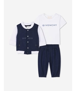 Givenchy's inherent sensibility and grammar of elegance are projected in this baby unisex denim blue tracksuit set. It contains a cardigan, trousers, and t-shirt. The cardigan is a bimaterial design via fleece denim and dynamic Givenchy patterning. The matching trousers are also engineered in the same material and design whilst the cotton jersey t-shirt showcases a metallic Givenchy print on the front. All of the pieces are beautifully presented in a gift box. Cardigan Front Snap Closure Trousers Elasticated Waist and Bottom Leg T-Shirt Shoulder Snap Closure 88 Cotton, 11 Polyester, 1 Elastane