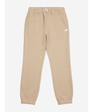 Introducing the Boys Brush Back Small Logo Joggers in Beige by New Balance, an essential addition to your little one's wardrobe for AW2024. Elegantly designed to blend high-end style with practical comfort, here's what makes these joggers a must-have Subtle Elegance Classic beige with a discreet New Balance logo, perfect for versatile styling. Premium Comfort Crafted from soft, superior fabric ensuring all-day ease and durability. Tailored Fit Snug yet flexible fit suited for playful days and quiet evenings alike. Enhance your boys wardrobe with a touch of class comfort. Order now!