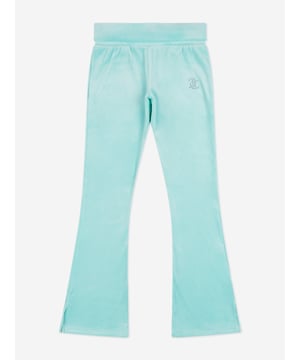Juicy Couture is an American brand infused with an irreverent attitude and casual glamour synonymous with the velour tracksuit. These girls blue fold over waist joggers are a captivating construction. Envisioned with pockets and an elasticated waist showcasing diamante brand detail. The piece is signified by the sparkly 'JC' motif. Spliced Hem 95 Polyester, 5 Elastane