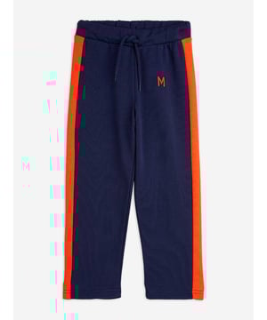 Introducing the Boys Panel Embroidered Joggers in Navy by mini rodini, a quintessential addition for your boy's wardrobe for SS2025. Merging sophistication with playfulness, these joggers epitomize high-end comfort with a dash of flair. Key features include Exquisite Embroidery Elegant detailing that elevates the everyday. Premium Fabric Crafted in luxurious, breathable materials. Versatile Navy Hue Perfect for mixing and matching. Refresh your child's attire with a touch of designer charm shop these joggers today!