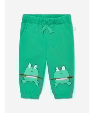 Stella McCartney portray a vibrant aesthetic via their cool and beautifully crafted designs. These baby unisex green joggers are woven from beautiful organic cotton. They showcase an elasticated waist with side pockets and ribbed ankles. Embellished with frog prints on the legs. 100 Organic Cotton