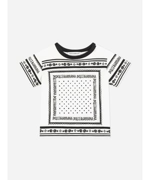Introducing the Dolce Gabbana Baby Boys Bandana Print T-Shirt in pristine white a quintessential addition to your little ones wardrobe for SS2025!Key features include Crafted in Italy Exemplary attention to detail ensures unmatched quality and durability. Playful Bandana Design A fresh, chic print that adds a dash of whimsy to your boy's ensemble. Pure Comfort Made with premium materials for superior softness and comfort, ideal for daily wear.Elevate his style with subtle luxury and playful charm!