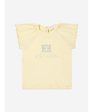 Introduce a splash of sunshine to your little girls wardrobe with the exquisite Escada Girls Embroidered Logo Dress in Yellow, poised to dazzle in SS2025. Crafted with precision, this designer piece merges haute couture with youthful grace. Luxurious Fabric Crafted from premium fabric for supreme comfort elegance. Vibrant Yellow A bright, cheerful yellow that captures the spirit of summer. Signature Embroidery Features Escada's iconic logo intricately embroidered for a touch of exclusivity. Timeless Style Perfect for any occasion, blending classic charm with modern flair.Elevate her style with Escada where every stitch spells sophistication!