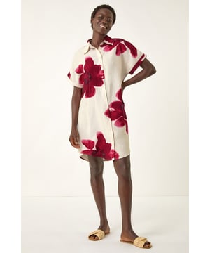 Floral Print Shift Shirt Dress from Roman. Elevate your Spring Summer wardrobe with this chic floral print shirt dress. Featuring a stylish shirt collar and short turn-up sleeves, this knee-length shift dress is perfect for warm days. Made from a comfortable woven fabric, this dress is adorned with a beautiful floral print and front button details. For a casual yet stylish look, pair with a denim jacket and wedged heels!