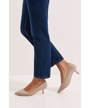 Wide fit design for enhanced comfort
        Kitten heel measuring between 5 and 6.5cm
        Pointed toe silhouette for a sleek appearance
        Versatile court shoe style suitable for various occasions
        Faux leather upper for a polished look
    
    Step into sophistication with these wide fit kitten heel court shoes from Dorothy Perkins. Perfect for the fashion-conscious woman who values both style and comfort, these shoes strike an ideal balance for your workwear wardrobe. The modest heel height offers stability while still providing a touch of elegance, making them suitable for long days at the office or important meetings. Pair them with tailored trousers and a crisp blouse for a refined look, or team with a knee-length pencil skirt for a classic ensemble. The versatile design ensures these shoes will become a staple in your wardrobe, transitioning effortlessly from day to evening events. Whether you're heading to a business lunch or attending a work conference, these court shoes will keep you looking polished and professional without compromising on comfort.